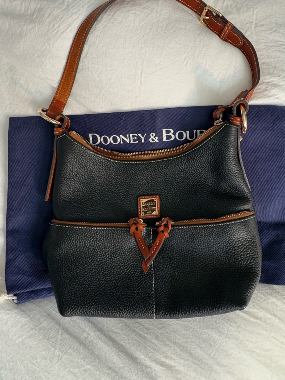 Dooney & Bourke Black Pebbled Leather Bag with Brown Trim. New with DB bag.
